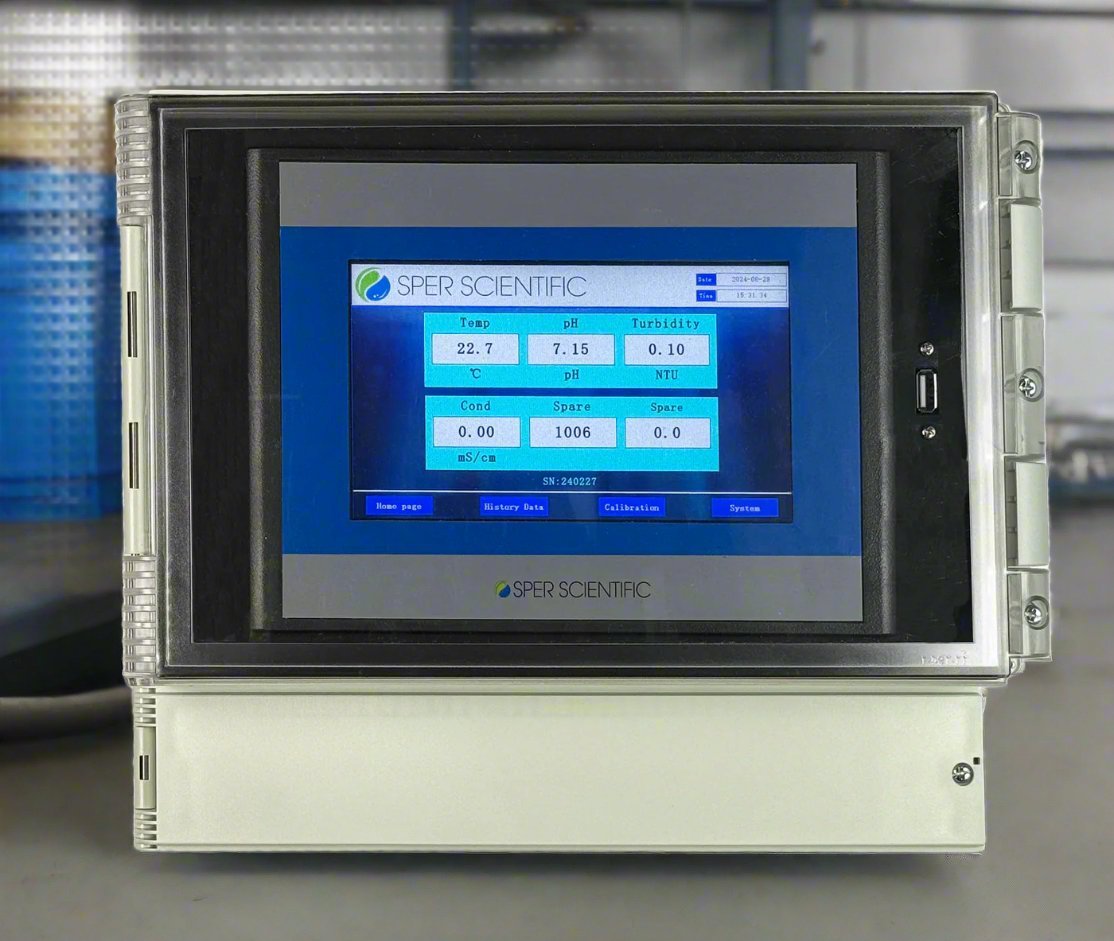 Online multi-parameter water quality analyzer by Sper Scientific with a digital display showing sensor readings.