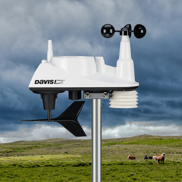 Davis Instruments weather station setup with an anemometer, solar sensor suite, rain gauge and digital display