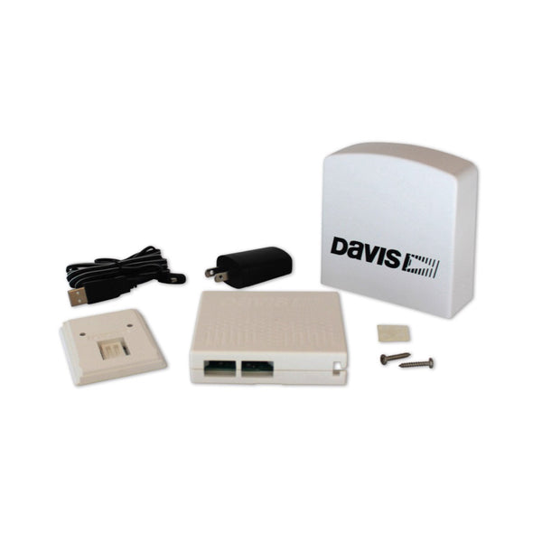 Air quality monitor by Davis Instruments, including charger, cable, mounting screws, and adhesive.