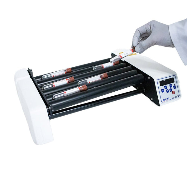 Benchmate digital tube roller by Oxford Lab Products with test tubes being placed on rollers.