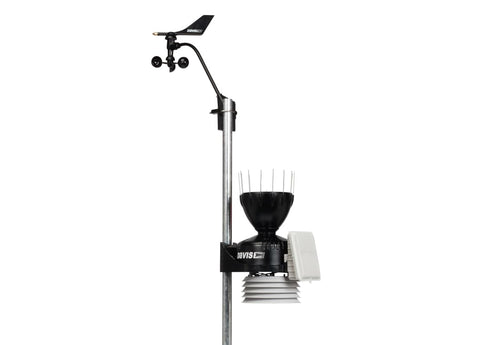 Complete weather station by Davis Instruments on a metal pole including a rain collector and anemometer.

