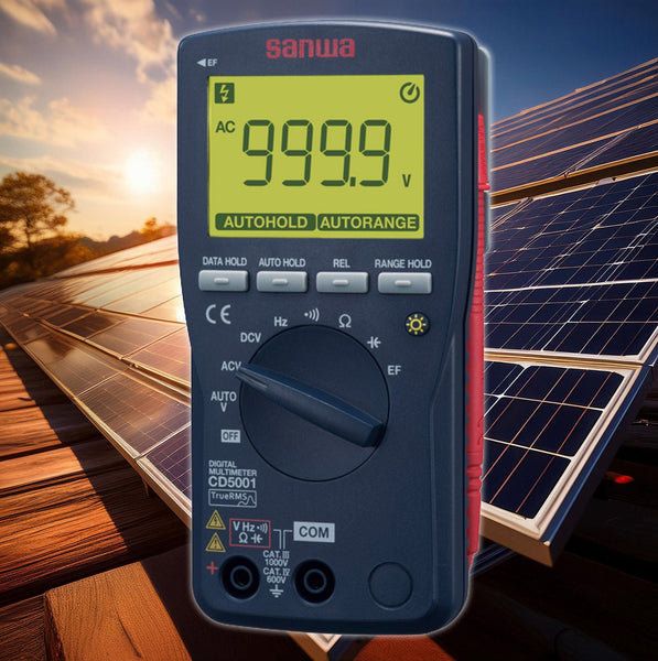 Digital multimeter with True RMS, model CD5001, by Sanwa, shown against a solar panel background.
