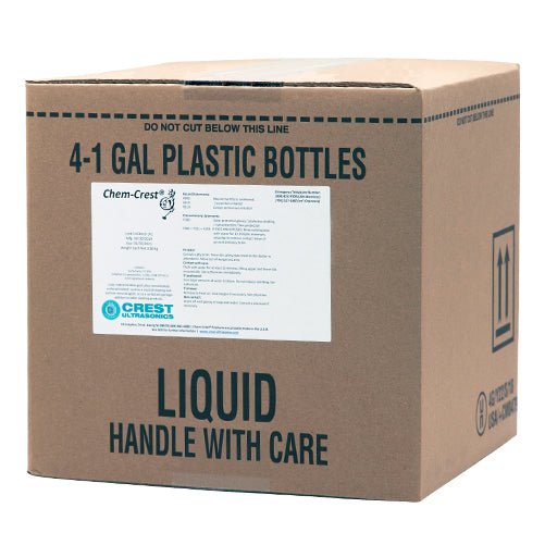 Case of ultrasonic cleaner solutions by Crest Ultrasonics, packaged in a cardboard box with safety labels.