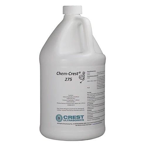 One gallon jug of ultrasonic cleaner solution by Crest Ultrasonics, with label and safety information.
