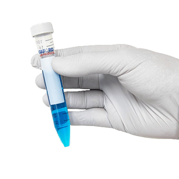 Blue conical centrifuge tube by Oxford Lab Products held in a gloved hand, isolated on white.

