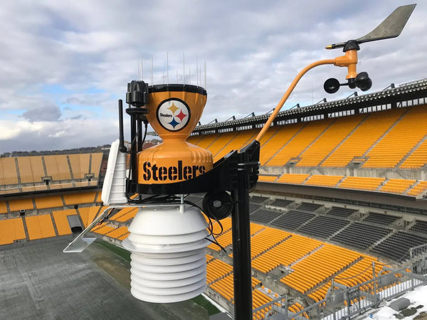 Weather station by Davis Instruments showing a Steelers team design, installed in a stadium setting.