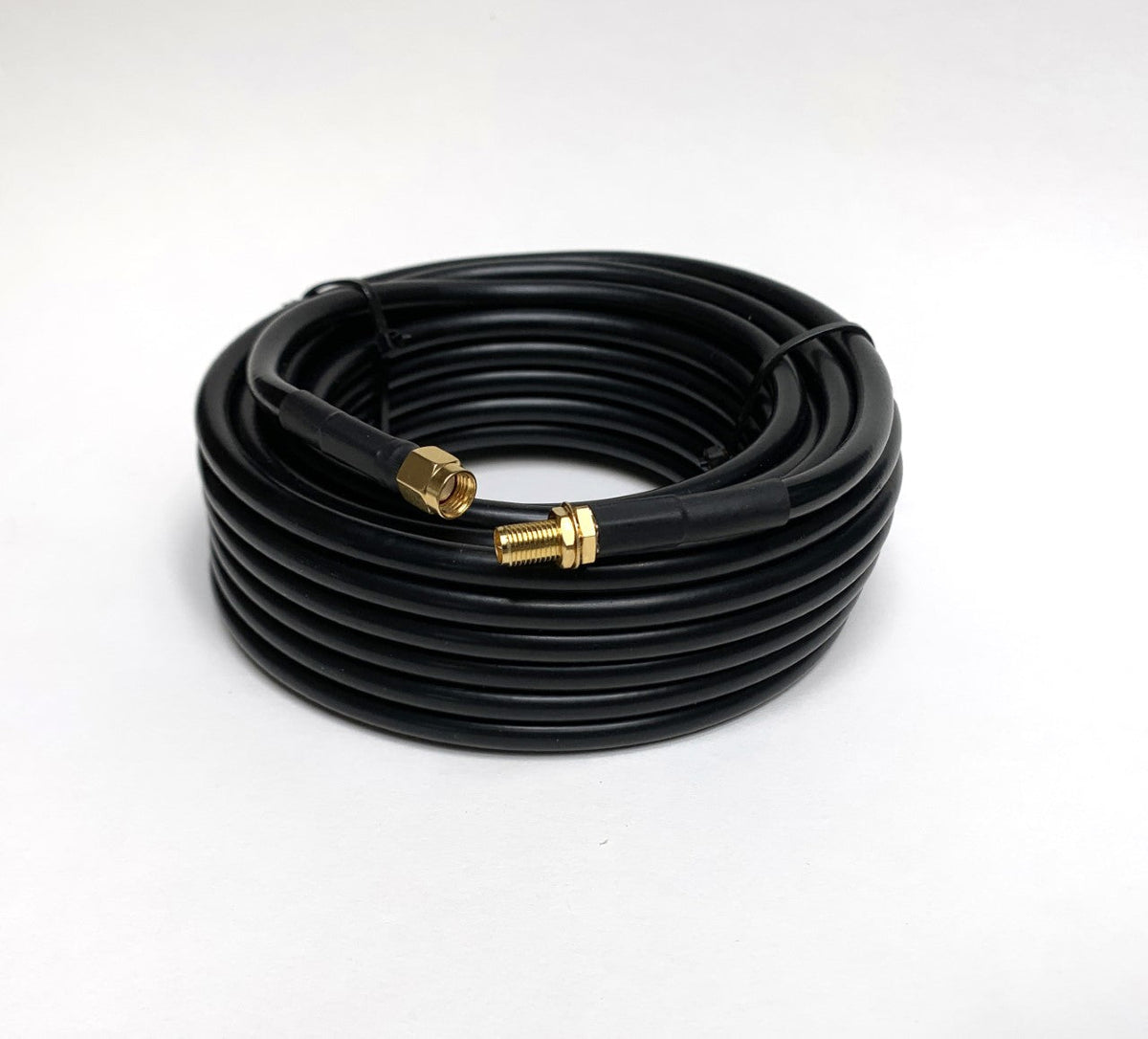 Black extension cable by Davis Instruments with gold-colored threaded ends coiled against a white background.