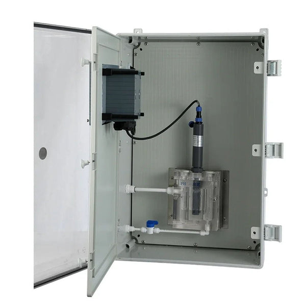 Online residual chlorine analyzer by Sper Scientific in a gray box with a clear plastic flow cell and piping.