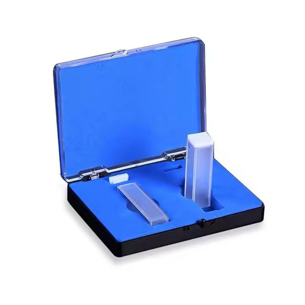 Spectrophotometer micro cuvettes with lid by Sper Scientific in an opened blue storage box with black trim.
