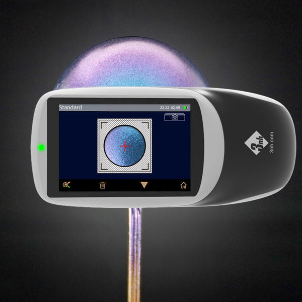 Multi-angle spectrophotometer by 3nh, with color touchscreen on stand and iridescent dome.