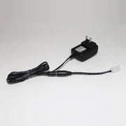 Black AC charger kit by Davis Instruments featuring a standard two-prong plug and a white two-pin connector.