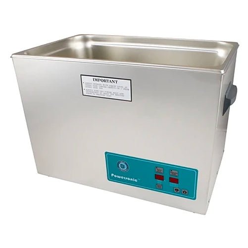 Stainless steel benchtop cleaner tank by Crest Ultrasonics, with a control panel and label.