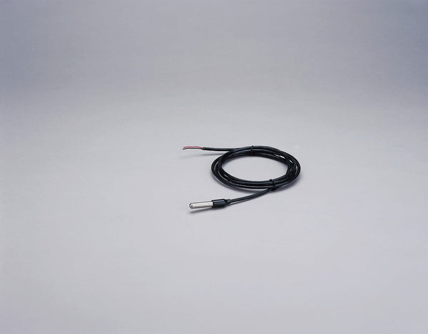Stainless steel temperature probe with two-wire termination by Davis Instruments, coiled against a gray backdrop.