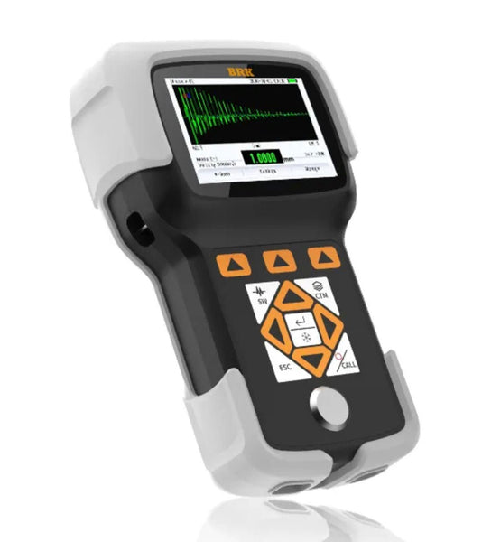 Ultrasonic precision thickness gauge from BRK featuring a black and gray handheld design with a screen displaying a waveform.
