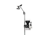 Wireless weather station by Davis Instruments, showing an anemometer and rain collector mounted on a metal pole.