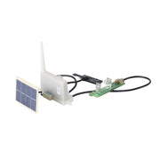 Replacement part PCBA by Davis Instruments with a solar panel, antenna, and black cable.
