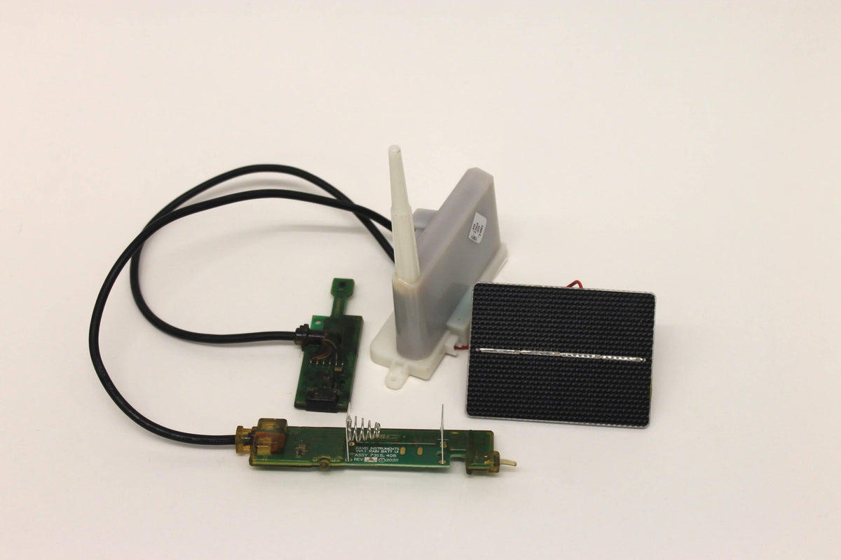 Replacement part by Davis Instruments with two circuit boards, cord, solar panel and plastic component.