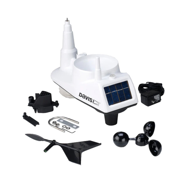 White Vantage Vue weather station by Davis Instruments with a solar panel and black wind gauge.