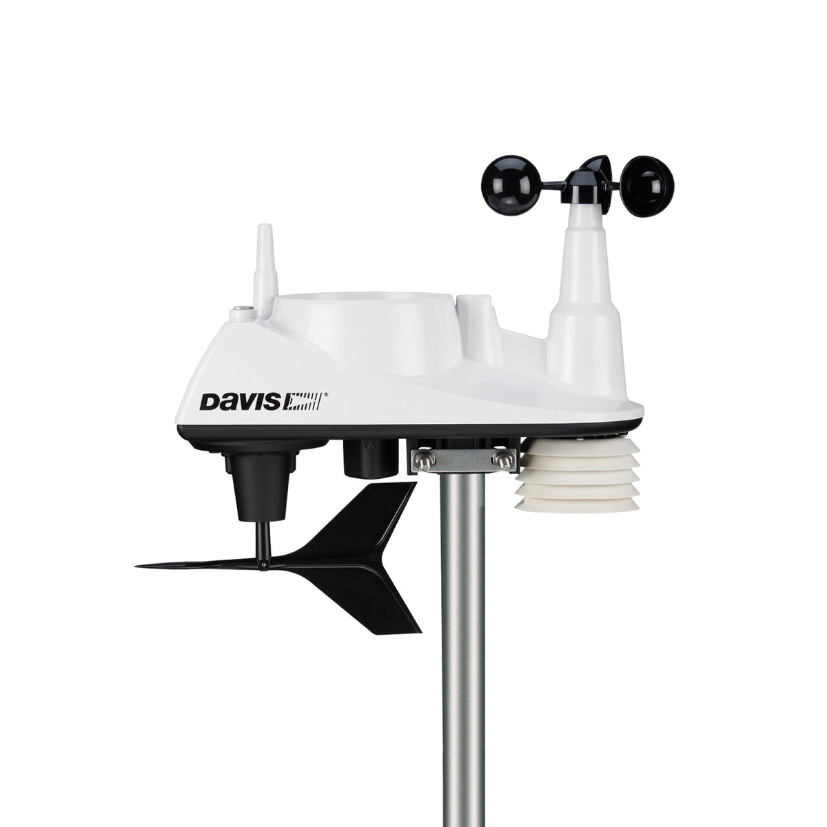 White integrated sensor suite weather station by Davis Instruments mounted on a silver pole against a white background.
