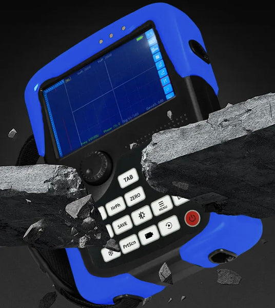 Blue digital eddy current flaw detector by BRK, positioned amidst fractured concrete, with a reflective surface beneath.