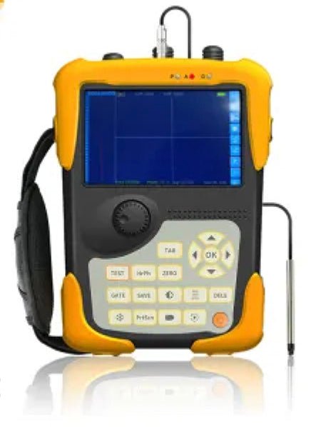 Digital ultrasonic flaw detector by BRK in a yellow and gray case, featuring a screen and control buttons.