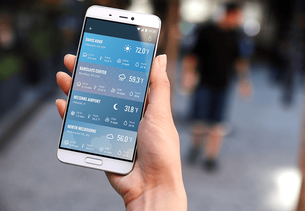 Weather data on a phone's screen by Davis Instruments, with weather forecasts for several cities shown.
