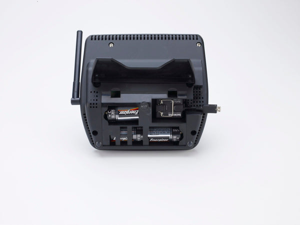 WeatherLink® USB data logger by Davis Instruments with a USB connector and Energizer batteries in the battery compartment.
