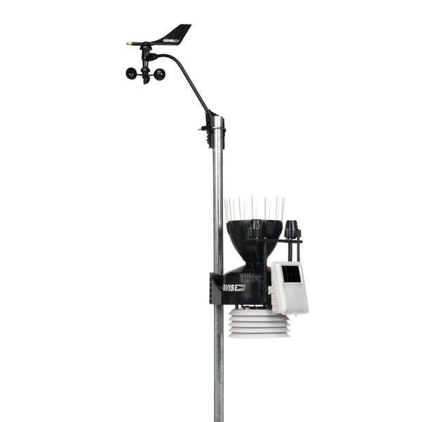 Wireless Vantage Pro2 Plus weather station by Davis Instruments with sensors and solar panel mounted on a pole.

