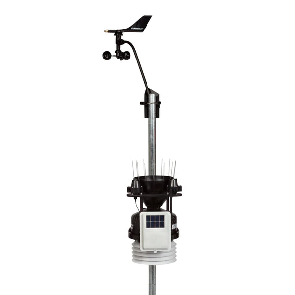 Wireless weather station by Davis Instruments with solar panel and rain collector.