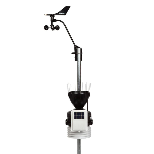 Wireless weather station with standard radiation shield by Davis Instruments featuring a solar panel and anemometer.