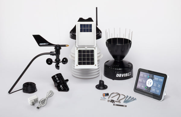 Wireless Vantage Pro2 weather station with fan-aspirated radiation shield by Davis Instruments, along with the WeatherLink console and other accessories.
