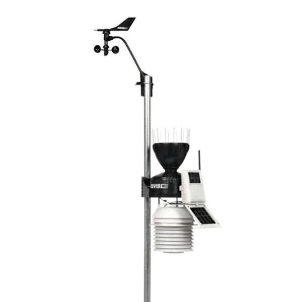 Wireless weather station with fan-aspirated radiation shield by Davis Instruments with anemometer, rain collector, and solar panel.