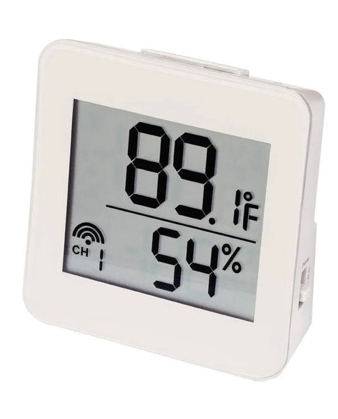 Compact temperature and humidity monitor by Sper Scientific displaying a digital reading in a white case.
