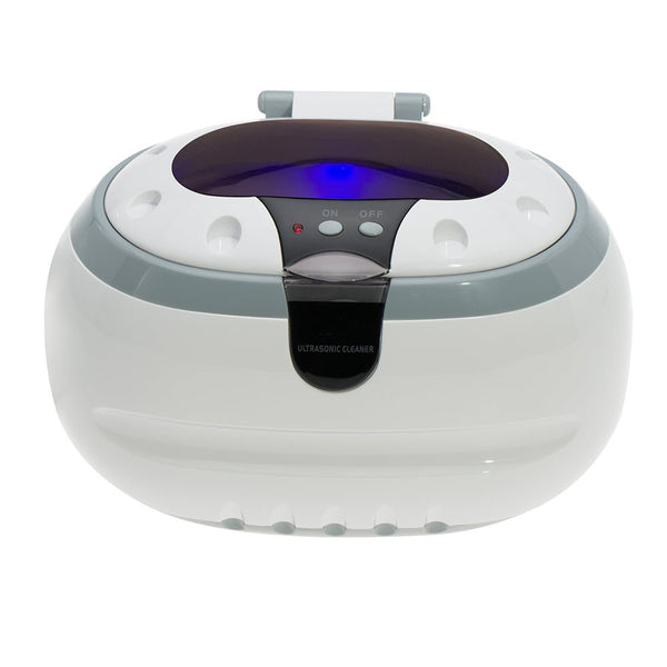 White mini ultrasonic cleaner with stainless steel tank by Sper Scientific, featuring a gray trim and dark control panel.
