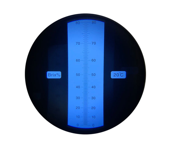 Sugar/Brix refractometer with 0 to 80% range by Sper Scientific, displaying a close up of the measurement scale at 20°C.
